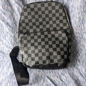 Check crossbody bag/backpack
